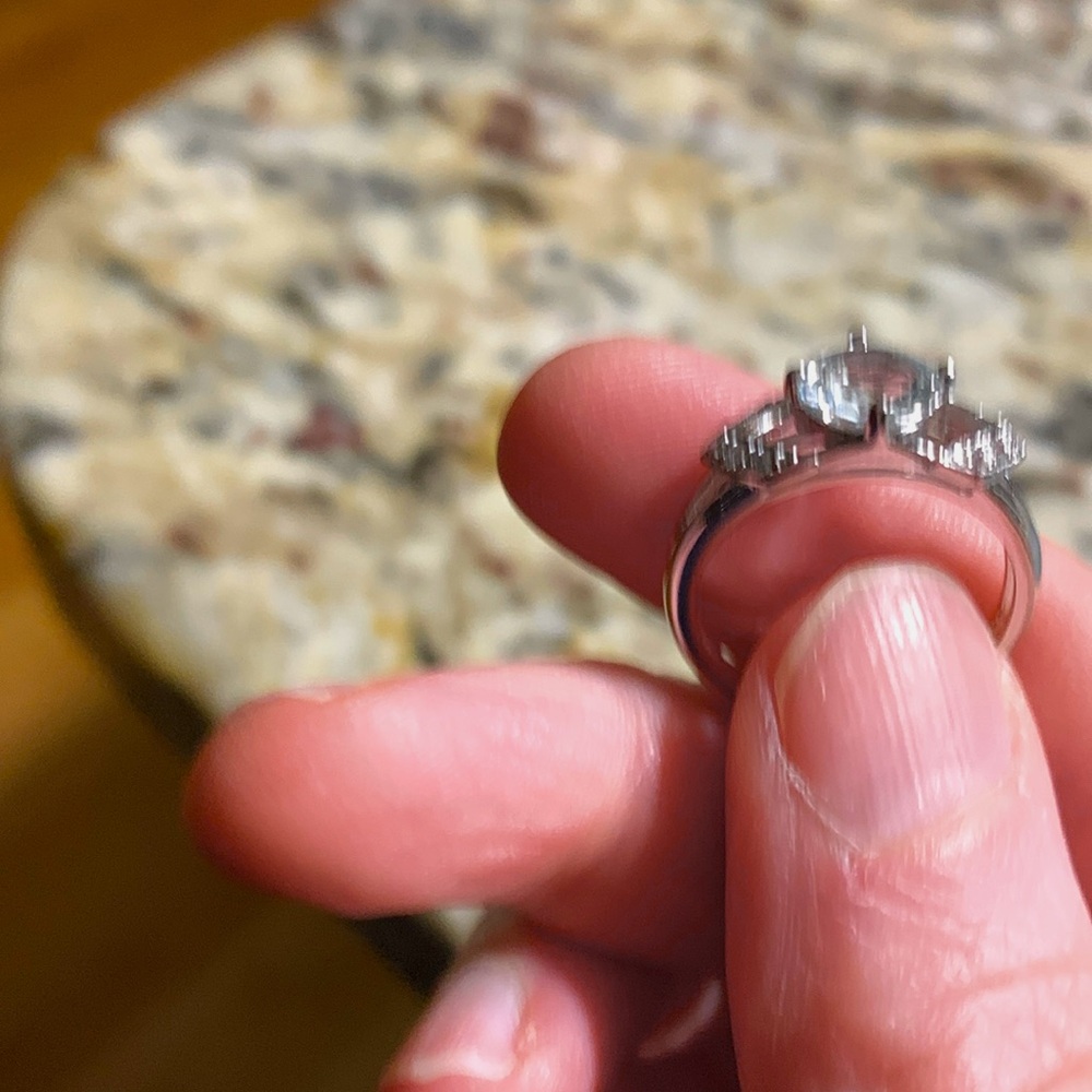 A silver gemstone ring